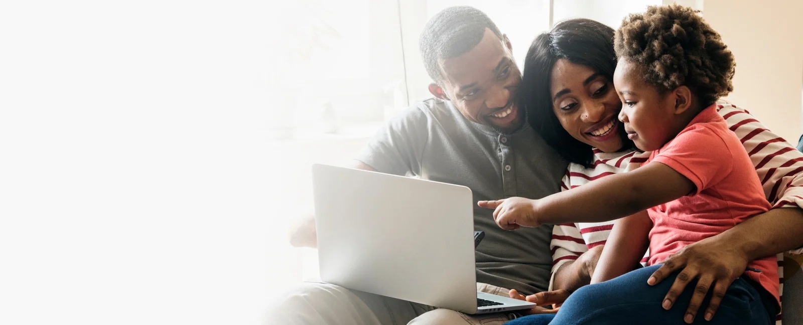 Family using computer with Norton protection